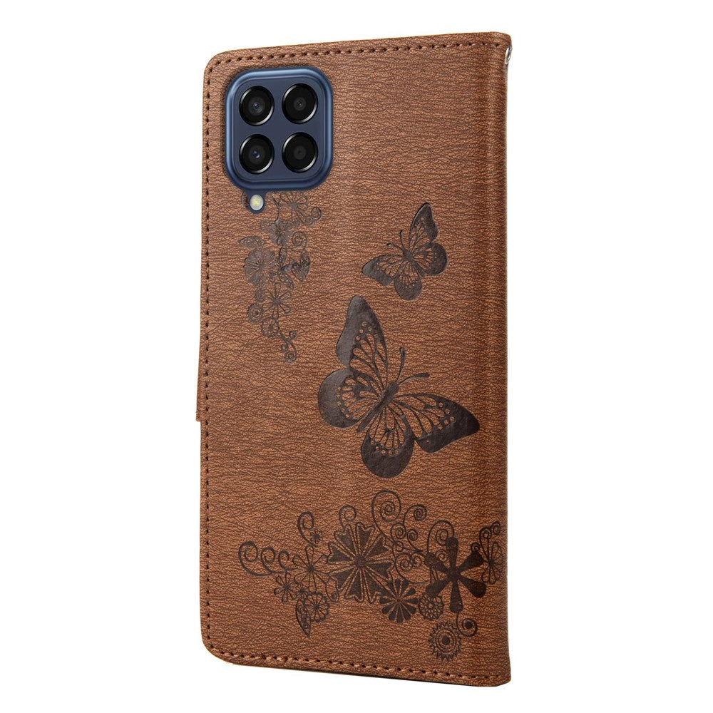 For Samsung Galaxy M33 5G (Global Version) Wallet Case Butterfly Flower Imprinted PU Leather Stand Flip Cover with Hand Strap - Brown