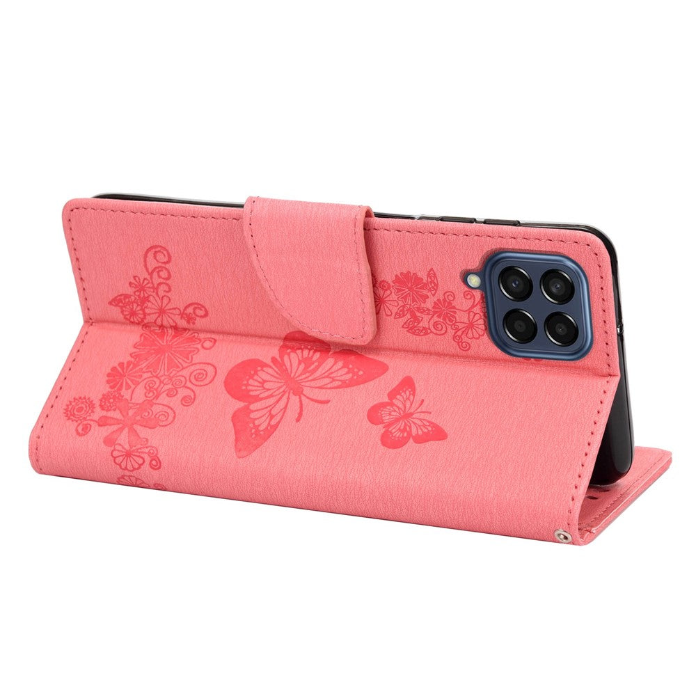 For Samsung Galaxy M33 5G (Global Version) Wallet Case Butterfly Flower Imprinted PU Leather Stand Flip Cover with Hand Strap - Pink