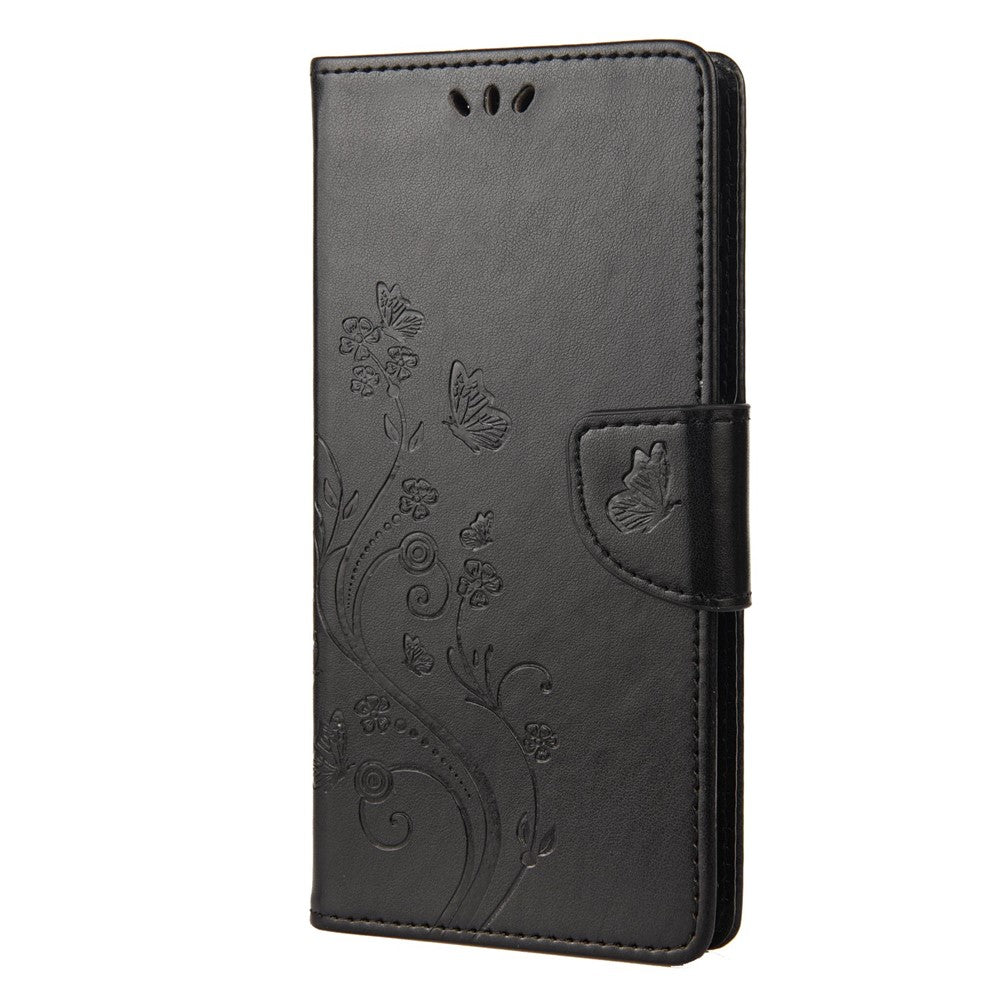 For Samsung Galaxy M33 5G (Global Version) Butterfly Flower Imprinted Wallet Case, PU Leather Foldable Stand Flip Cover with Hand Strap - Black