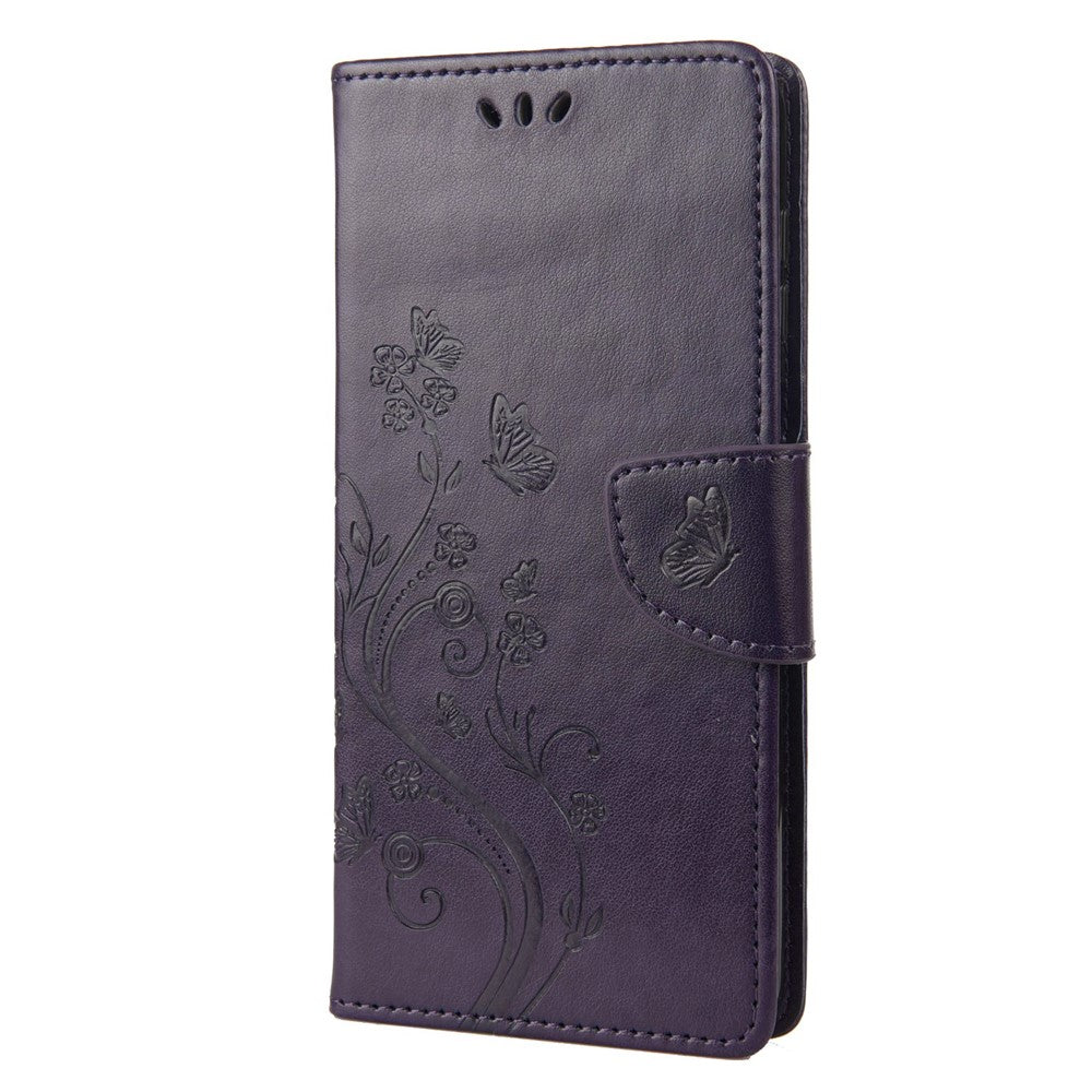 For Samsung Galaxy M33 5G (Global Version) Butterfly Flower Imprinted Wallet Case, PU Leather Foldable Stand Flip Cover with Hand Strap - Purple