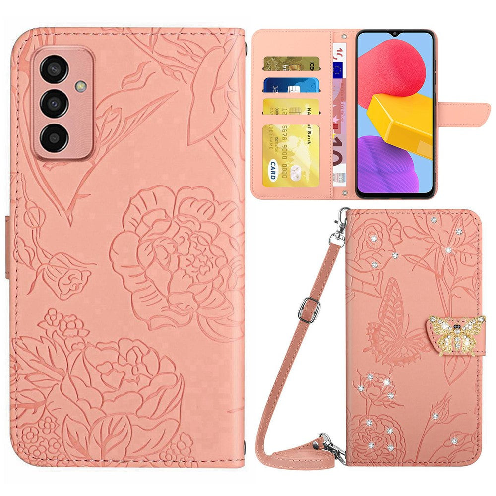 For Samsung Galaxy M13 4G Butterfly Flowers Imprinted Rhinestone Decor Phone Cover Wallet Stand Well-protected Leather Case with Shoulder Strap - Pink