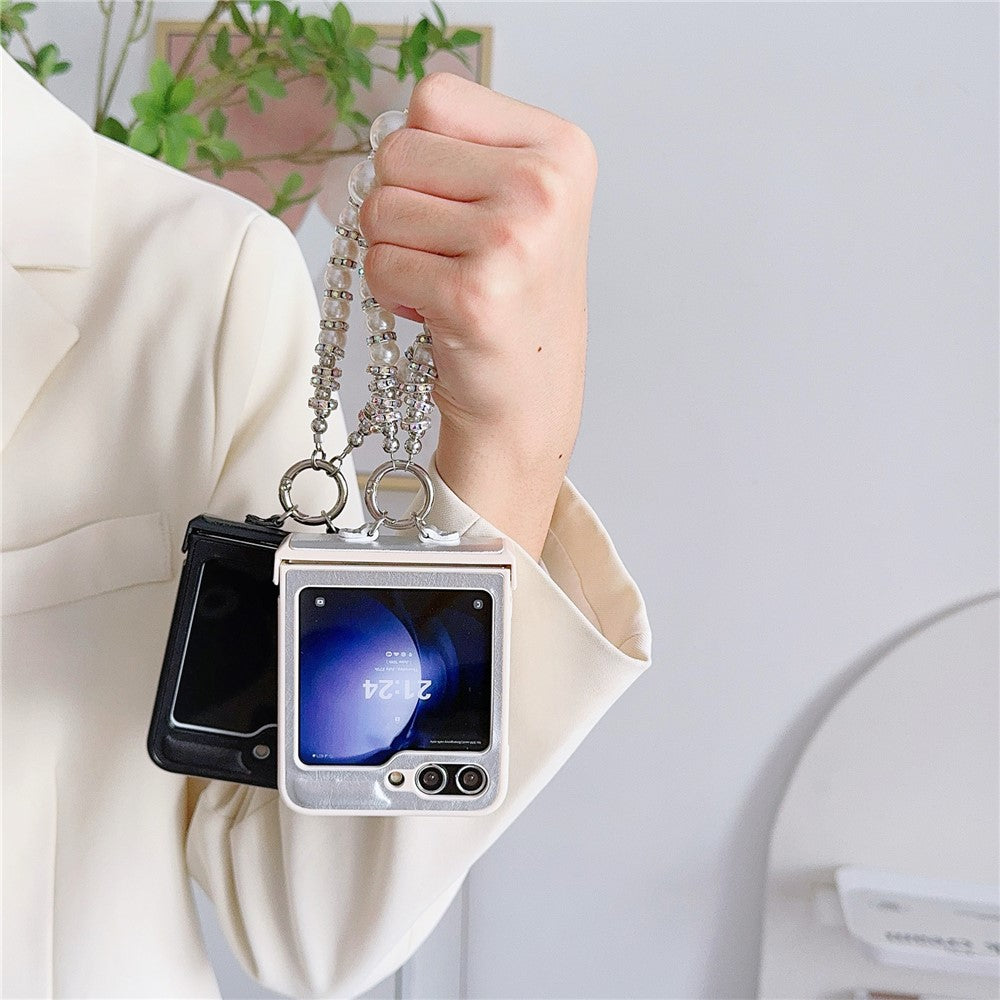 For Samsung Galaxy Z Flip7 FE 5G / Z Flip6 5G Case Crazy Horse Leather+PC Phone Cover with Wrist Pearl Strap - Black