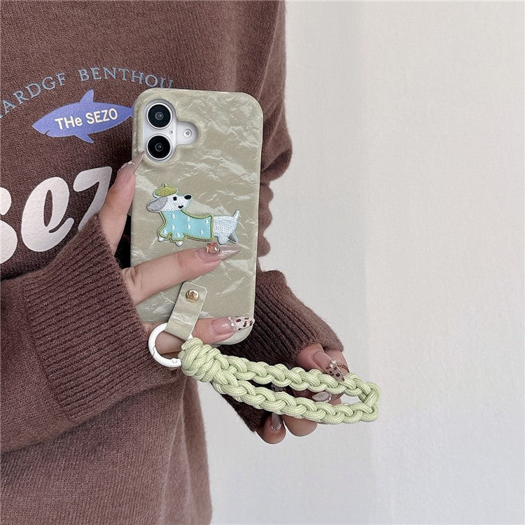 For iPhone 16 Case Cute Pattern Soft PU+PC Phone Back Cover with Braided Handy Strap - Lihgt Green Dog