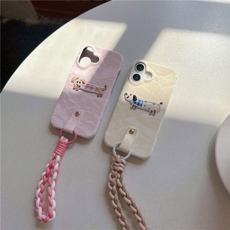 For iPhone 16 Case Cute Pattern Soft PU+PC Phone Back Cover with Braided Handy Strap - Lihgt Green Dog