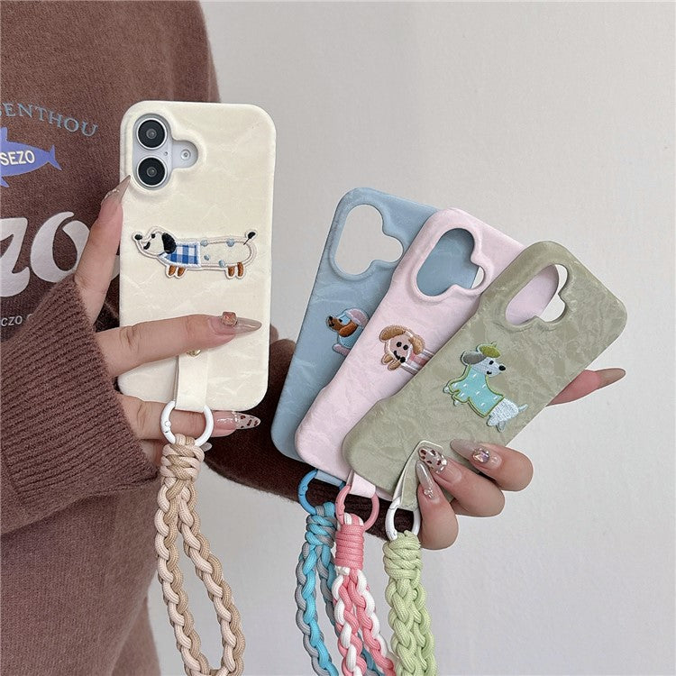 For iPhone 16 Case Cute Pattern Soft PU+PC Phone Back Cover with Braided Handy Strap - Apricot Dog