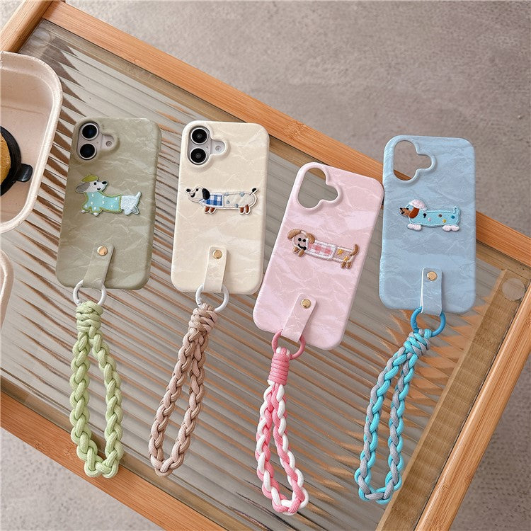 For iPhone 16 Case Cute Pattern Soft PU+PC Phone Back Cover with Braided Handy Strap - Apricot Dog