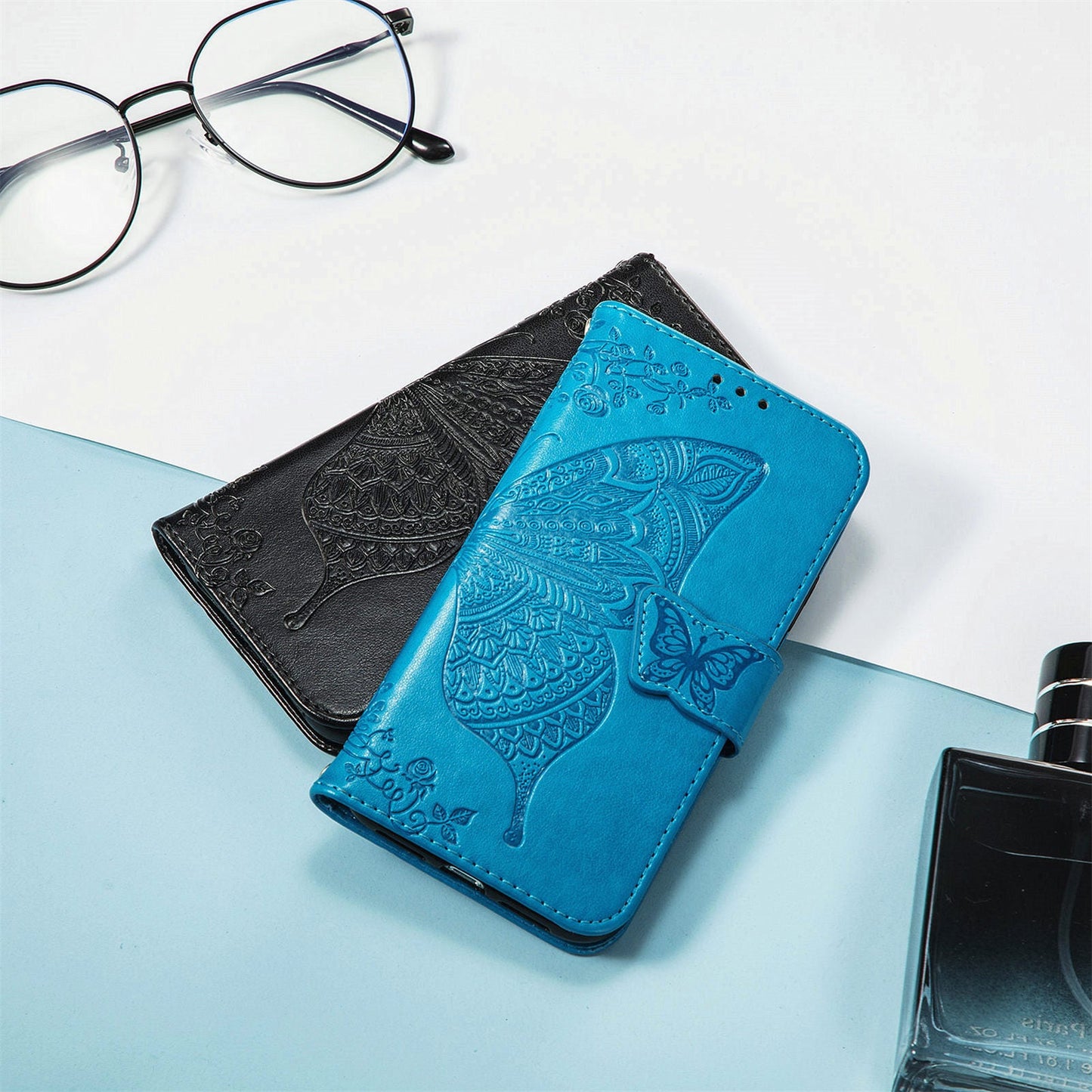 For iPhone 16e Case with Strap Butterfly Pattern PU Leather Wallet Phone Cover - Blue