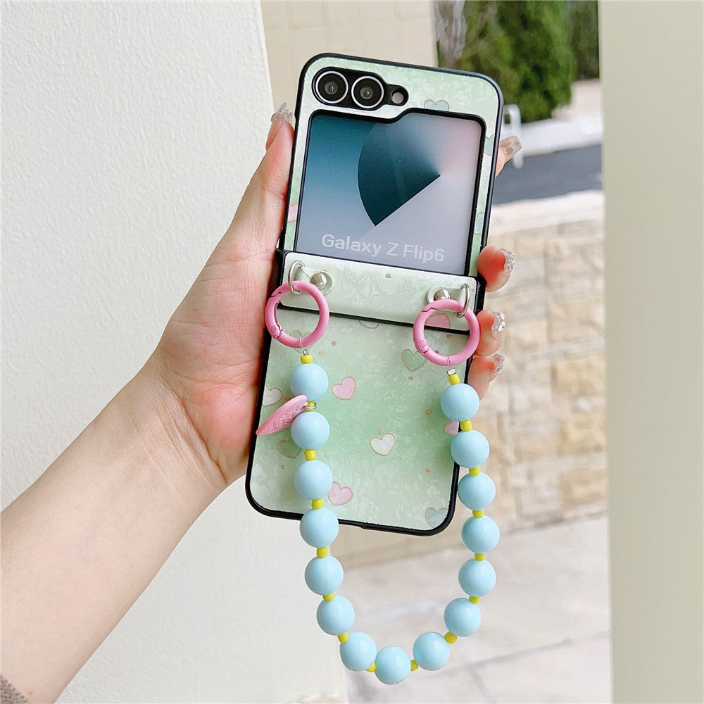 For Samsung Galaxy Z Flip7 FE 5G / Z Flip6 5G Case Anti Drop PC + PU Phone Back Cover with Beaded Strap Pattern Design - Green Heart