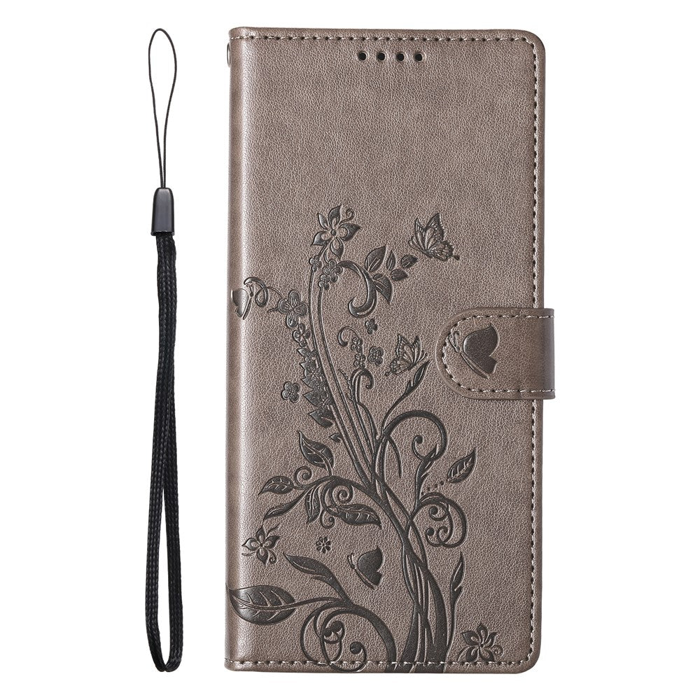 For iPhone 17 Pro Max Wallet Case Butterfly Floral Imprint PU Leather Phone Cover with Wrist Strap - Grey