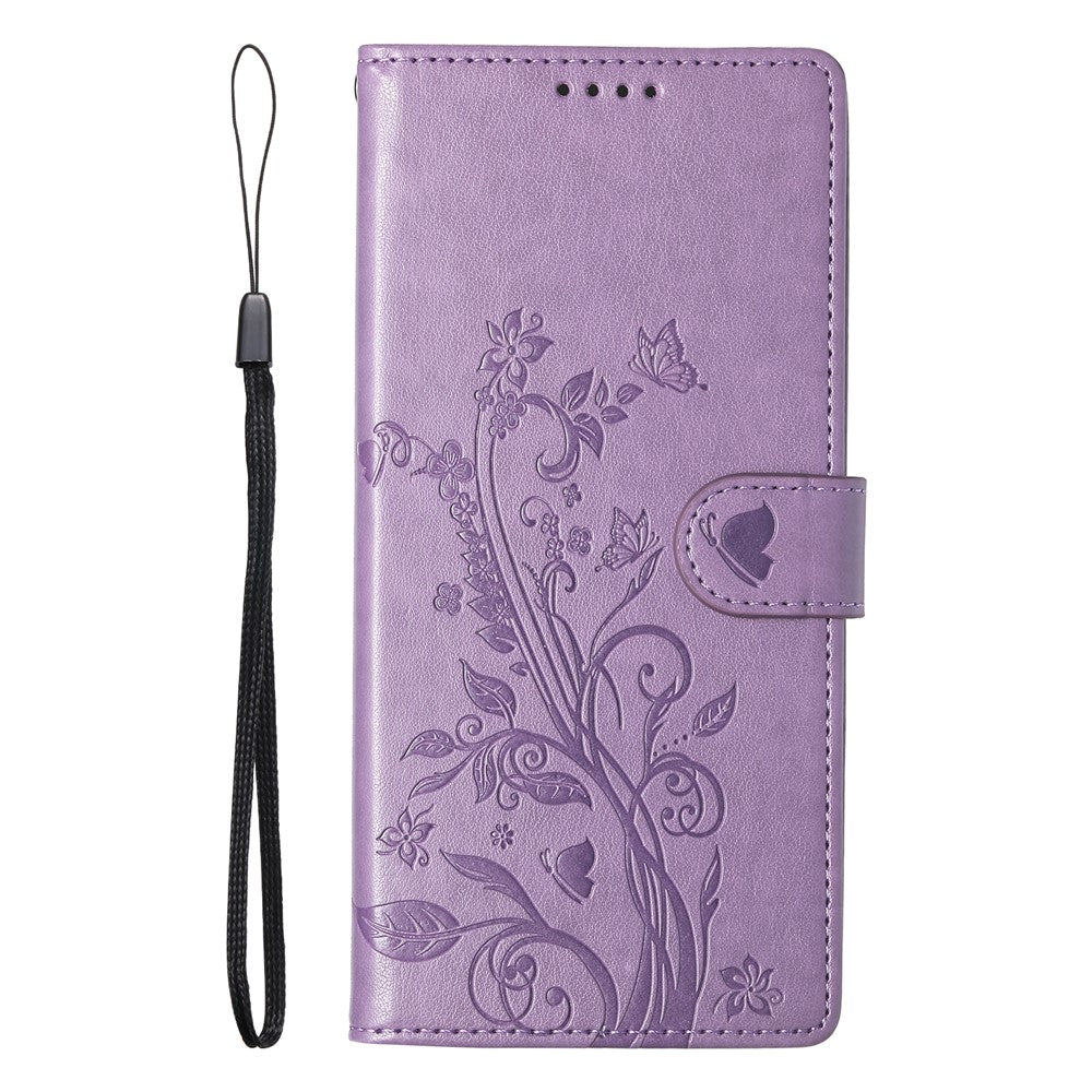 For iPhone 17 Pro Max Wallet Case Butterfly Floral Imprint PU Leather Phone Cover with Wrist Strap - Purple