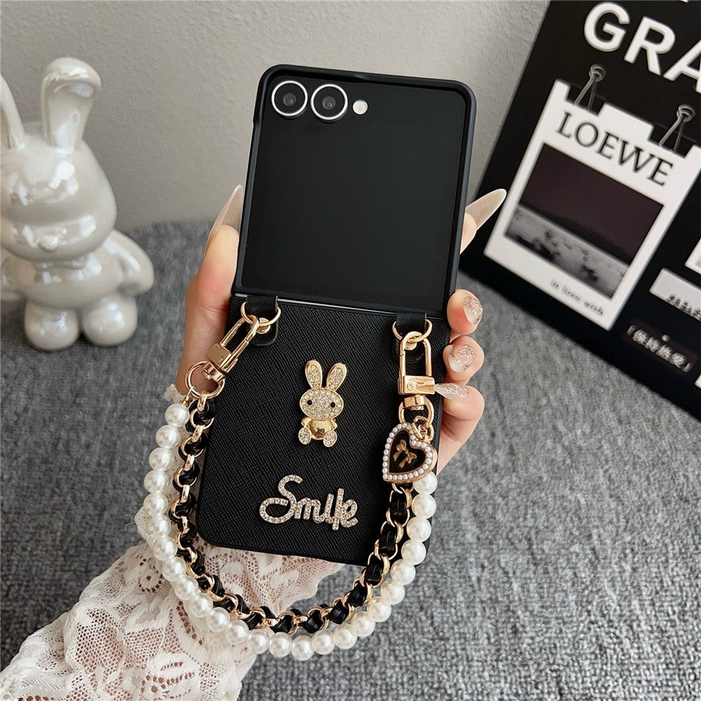 For Samsung Galaxy Z Flip7 5G Case Smile Rabbit PU + PC Phone Cover with Wrist Strap - Cross Texture