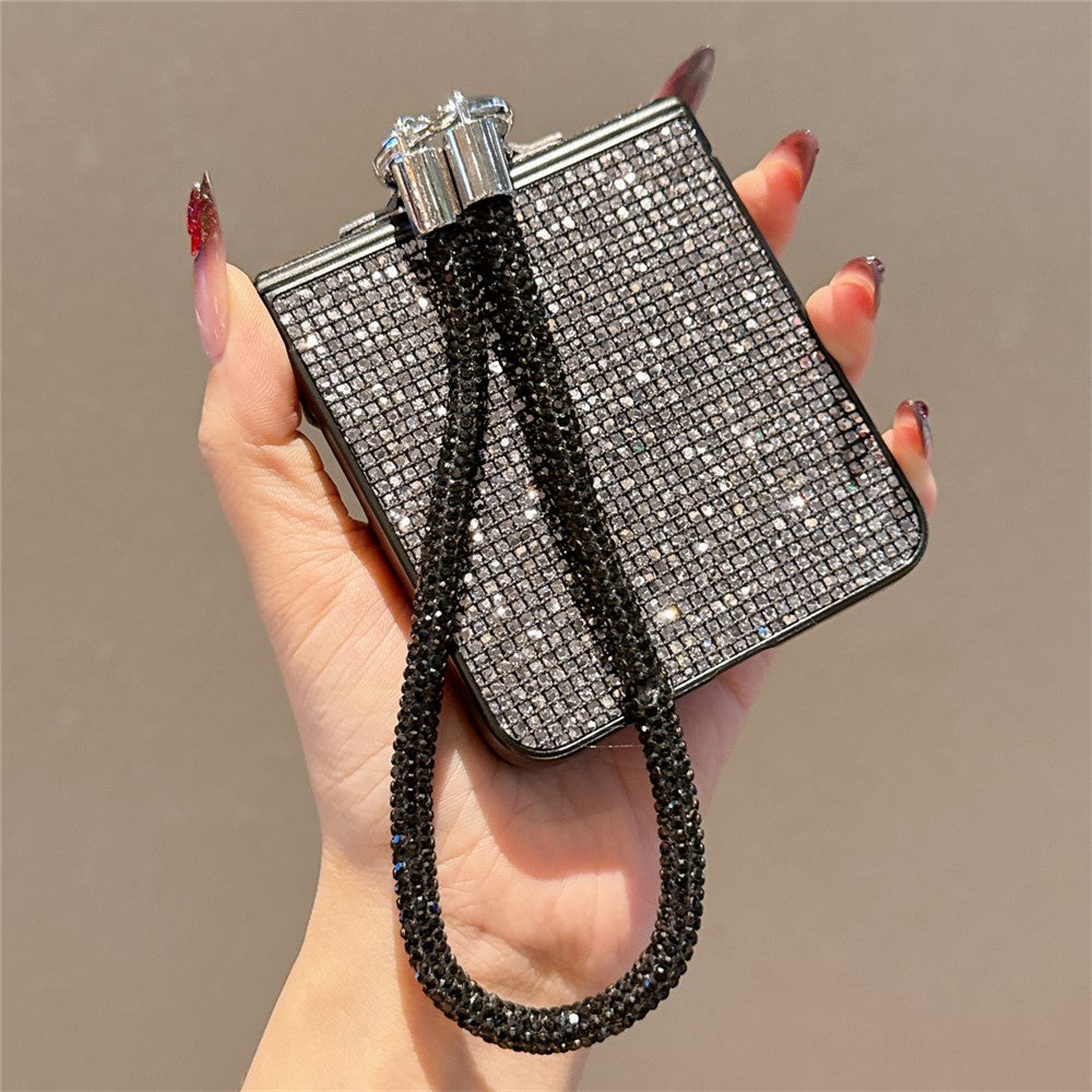 For Samsung Galaxy Z Flip7 5G Case Glitter TPU + PC Phone Cover with Rhinestone Wrist Strap - Black