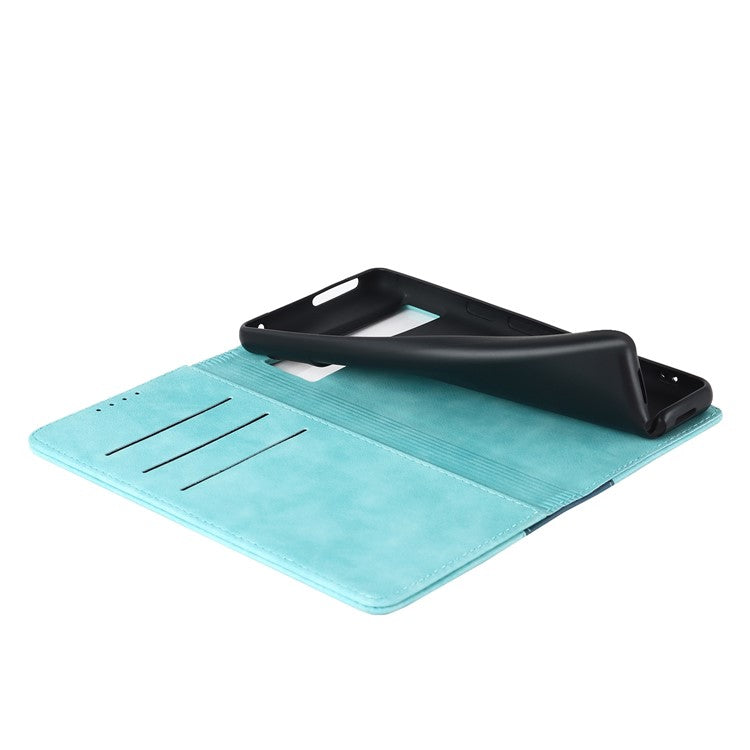 For Google Pixel 7 5G Calf Texture PU Leather Wallet Case Stand Magnetic Auto-absorbed Bi-color Splicing Flip Folio Phone Cover - Light Blue / Dark Blue