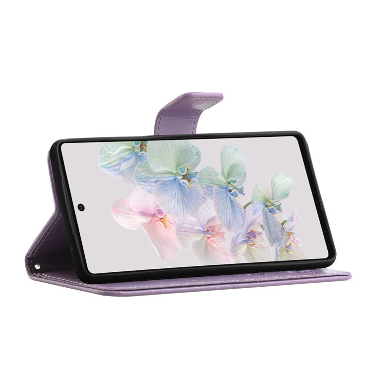 For Google Pixel 7a PU Leather Wallet Phone Case Imprinted Butterfly Flower Pattern Magnetic Closure Stand Flip Cover with Strap - Purple