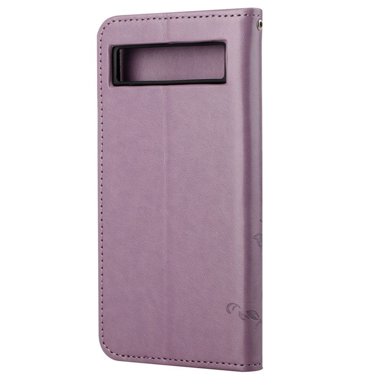 For Google Pixel 7a PU Leather Wallet Phone Case Imprinted Butterfly Flower Pattern Magnetic Closure Stand Flip Cover with Strap - Purple