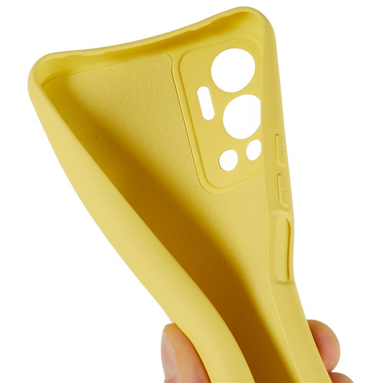 For Infinix Hot 12 4G Anti-Slip Liquid Silicone Texture Phone Case 2.0mm Thick Arc Edge Soft TPU Shockproof Back Cover - Yellow