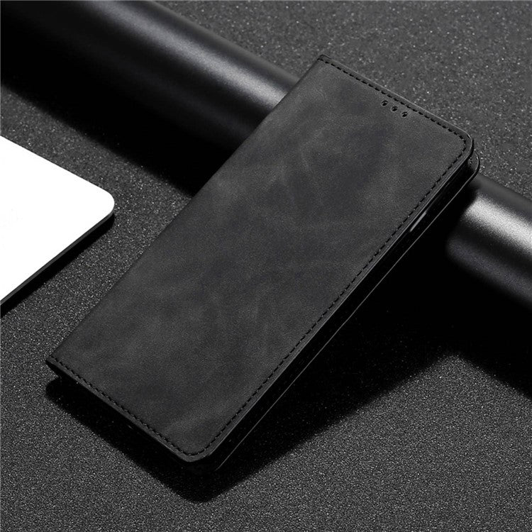 For Google Pixel 7a Drop-proof PU Leather Phone Case with Card Holders Skin-touch Feeling Magnetic Auto-absorbed Stand Flip Folio Phone Cover - Black