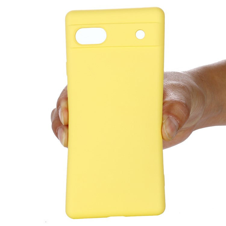 For Google Pixel 7a Liquid Silicone Case Cell Phone Cover Bump Proof Protector with Strap - Yellow