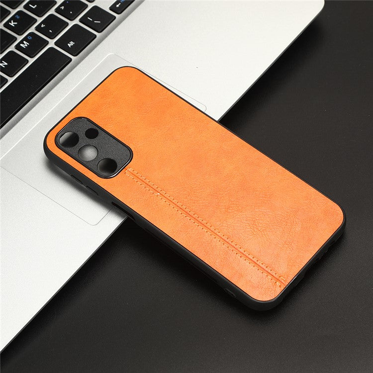 For Samsung Galaxy M14 5G Leather Coated TPU+PC Phone Case Cowhide Texture Anti-scratch Cover - Orange