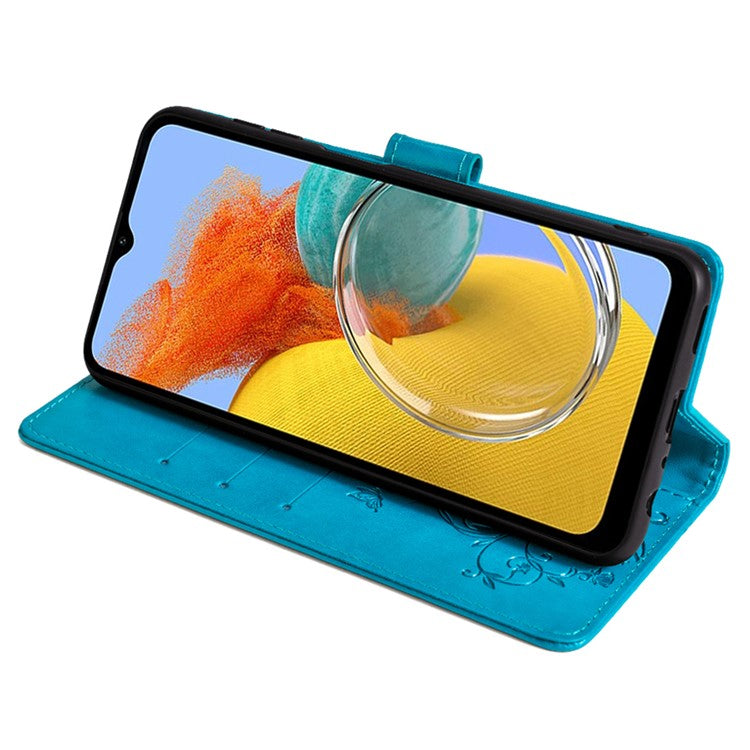 For Samsung Galaxy M14 5G Phone Case Butterfly Flower Imprinted Leather Flip Cover with Wrist Strap - Blue