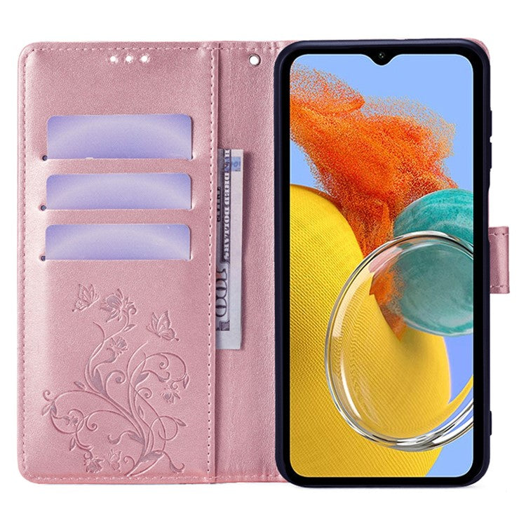 For Samsung Galaxy M14 5G Phone Case Butterfly Flower Imprinted Leather Flip Cover with Wrist Strap - Rose Gold
