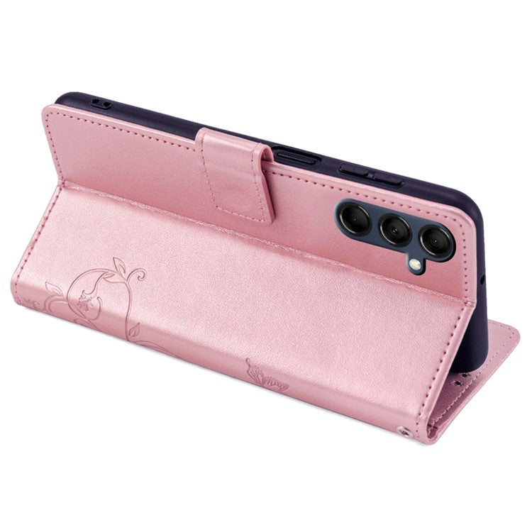 For Samsung Galaxy M14 5G Phone Case Butterfly Flower Imprinted Leather Flip Cover with Wrist Strap - Rose Gold