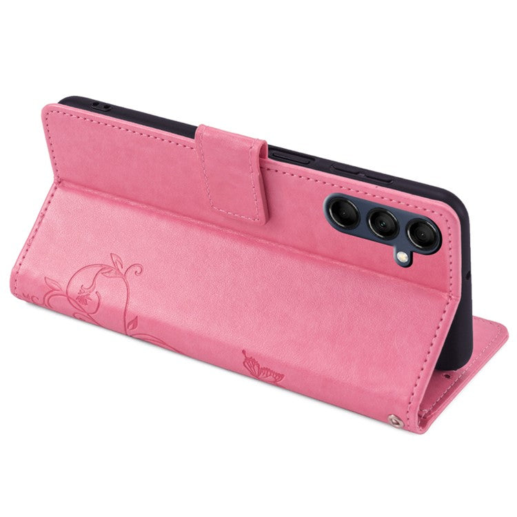 For Samsung Galaxy M14 5G Phone Case Butterfly Flower Imprinted Leather Flip Cover with Wrist Strap - Pink