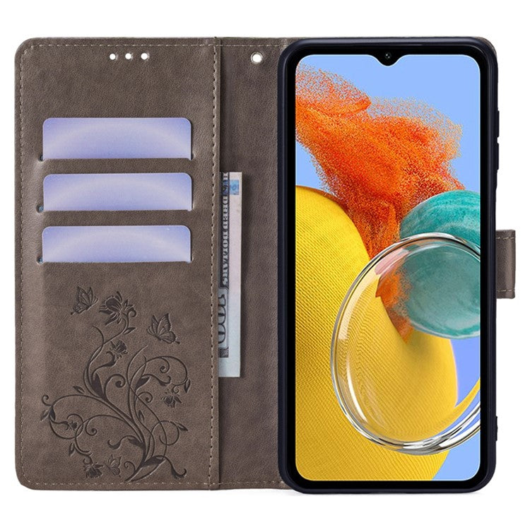 For Samsung Galaxy M14 5G Phone Case Butterfly Flower Imprinted Leather Flip Cover with Wrist Strap - Grey