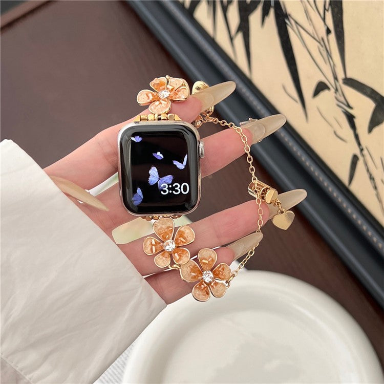 For Apple Watch Series 10 42mm / 9 8 7 41mm / SE (2023) SE (2022) SE 6 5 4 40mm / 3 2 1 38mm Flower Chain Strap Zinc Alloy Band - Orange