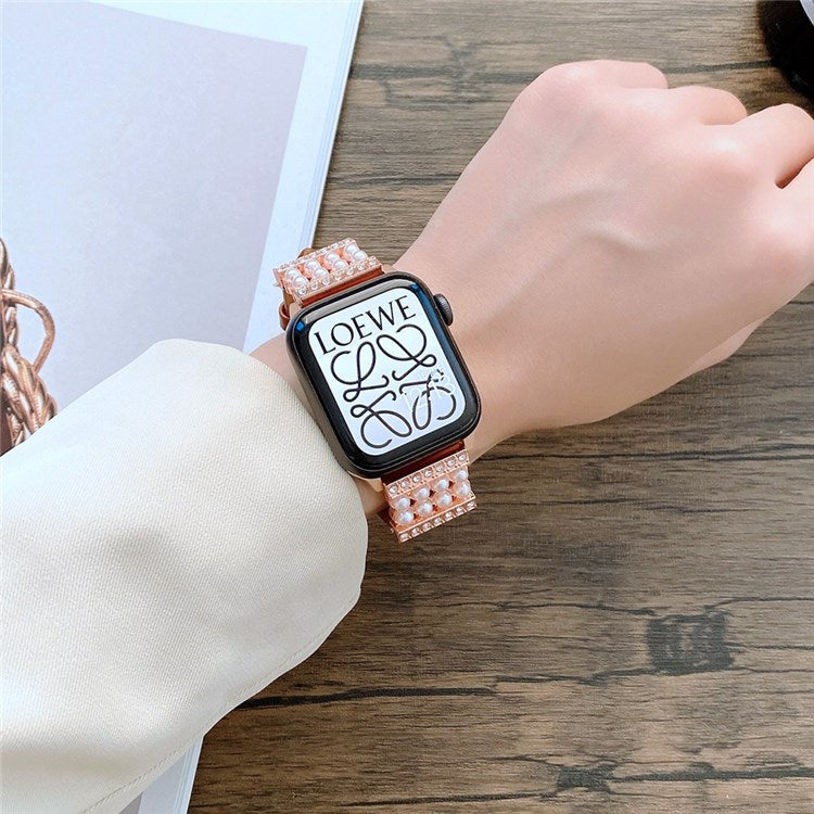 For Apple Watch Series 10 42mm / 9 8 7 41mm / 6 5 4 SE SE (2022) SE (2023) 40mm / 3 2 1 38mm Genuine Leather Pearl Rhinestone Decor Watch Band Wrist Strap - Red