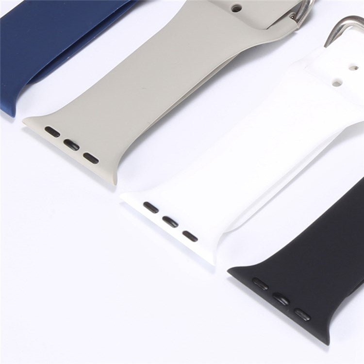 For Apple Watch Series 10 42mm / 9 8 7 41mm / 6 5 4 SE SE (2022) SE (2023) 40mm / 3 2 1 38mm Soft Silicone Watch Band Adjustable Wrist Strap with Silver Pin Buckle - Purple