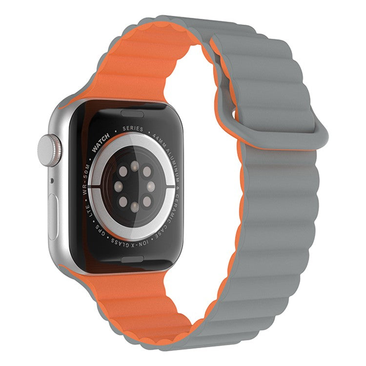 For Apple Watch Series 10 42mm / 9 8 7 41mm / 6 5 4 SE SE (2022) SE (2023) 40mm / 3 2 1 38mm Magnetic Adsorption Replacement Strap Silicone Watch Band with Tail Buckle - Grey / Orange