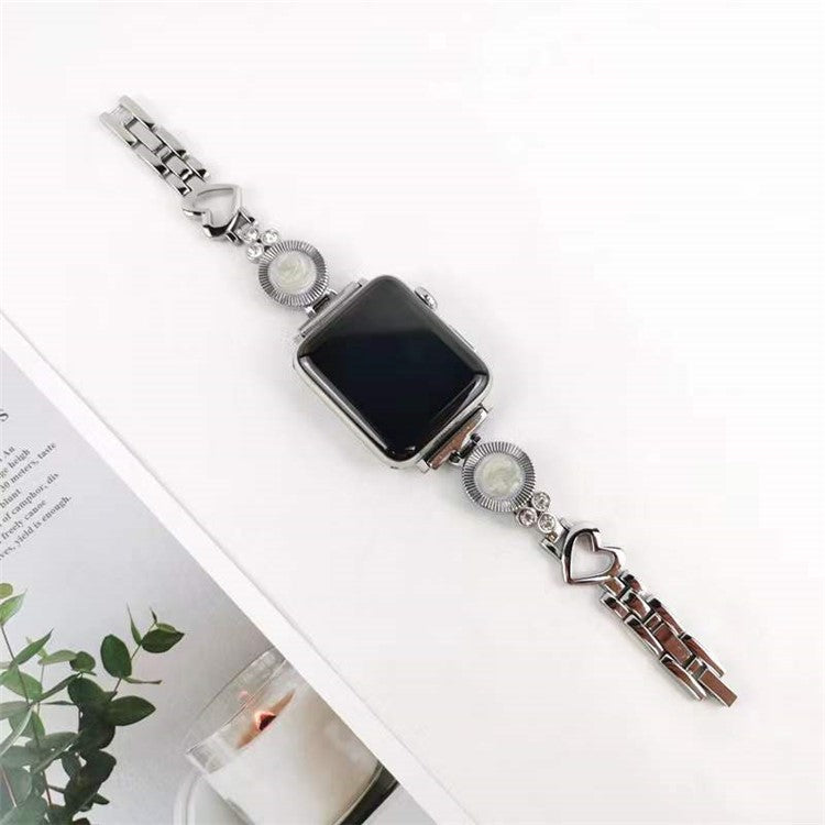 For Apple Watch Series 10 42mm / 9 8 7 41mm / 6 5 4 SE SE (2022) SE (2023) 40mm / 3 2 1 38mm Ethnic Style Metal Watch Band Heart Rhinestone Decor Bracelet Wrist Strap - Silver