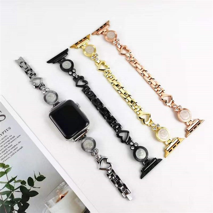 For Apple Watch Series 10 42mm / 9 8 7 41mm / 6 5 4 SE SE (2022) SE (2023) 40mm / 3 2 1 38mm Ethnic Style Metal Watch Band Heart Rhinestone Decor Bracelet Wrist Strap - Silver