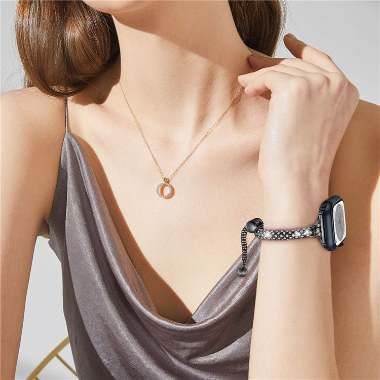 For Apple Watch Series 10 42mm / 9 8 7 41mm / 6 5 4 SE SE (2022) SE (2023) 40mm / 3 2 1 38mm Metal Stretch Jewelry Watch Strap Rhinestone Decorated Wristband for Women Girls - Black