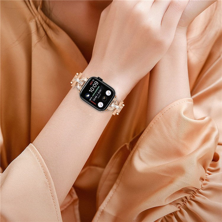 Watch Band for Apple Watch Series 10 46mm / Ultra 2 Ultra 49mm / Series 9 8 7 45mm / 6 5 4 SE (2023) SE (2022) SE 44mm / 3 2 1 42mm , 3-Bead Rhinestone Decor Stainless Steel Strap - Rose Gold
