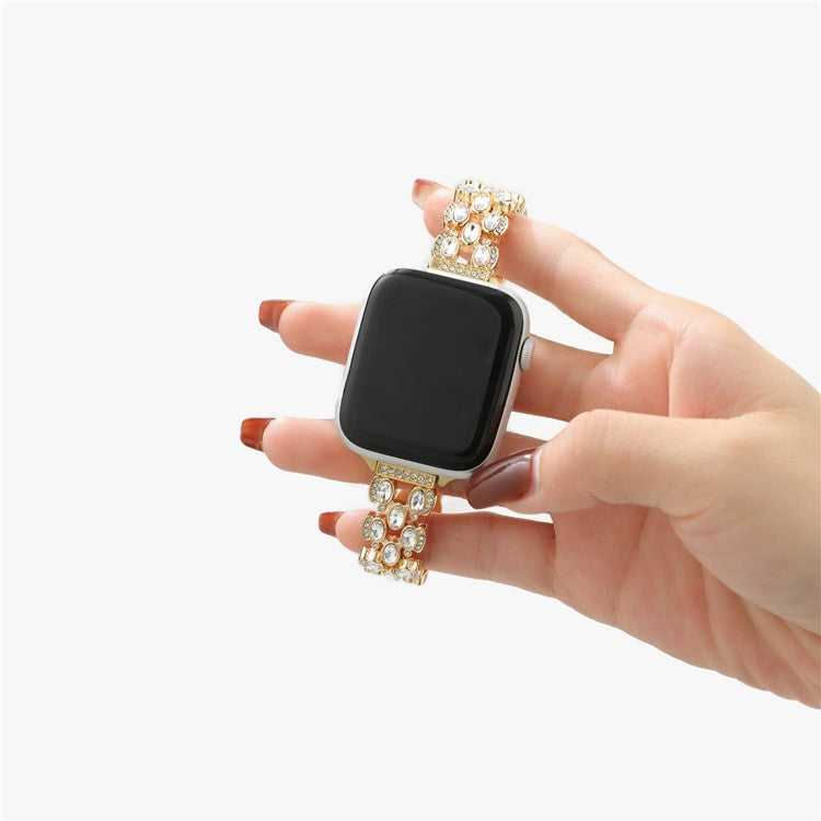 Watch Band for Apple Watch 10 46mm / Ultra 2 / Ultra 49mm / 9 8 7 45mm / SE (2023) SE (2022) SE 6 5 4 44mm / 3 2 1 42mm Rhinestone Decor Strap - Gold
