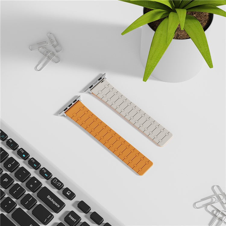 For Apple Watch 10 46mm / Ultra 2 / Ultra 49mm / 9 8 7 45mm / SE (2023) SE (2022) SE 6 5 4 44mm / 3 2 1 42mm Silicone Magnetic Band Strap - Orange / Starlight