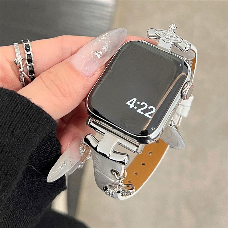For Apple Watch Series 10 42mm / 9 8 7 41mm / SE (2023) SE (2022) SE 6 5 4 40mm / 3 2 1 38mm Strap with Saturn Pendant - White+Silver Buckle