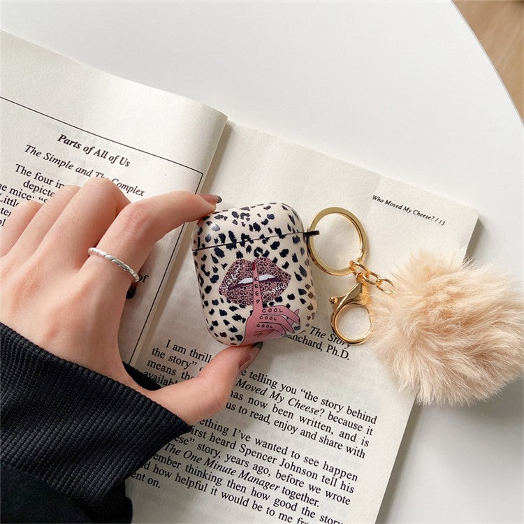 For Apple AirPods with Charging Case (2016) / (2019) / AirPods with Wireless Charging Case (2019) Anti-Drop Cover Lip Leopard Pattern TPU Headset Case with Hair-Ball Pendant
