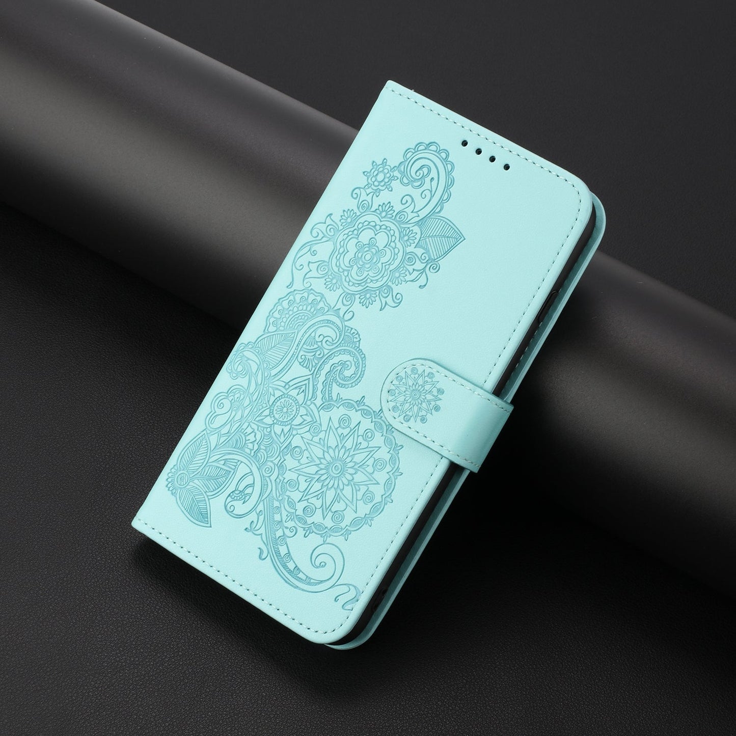 For iPhone 16e Datura Flower Embossed Flip Leather Phone Case(Light Blue)