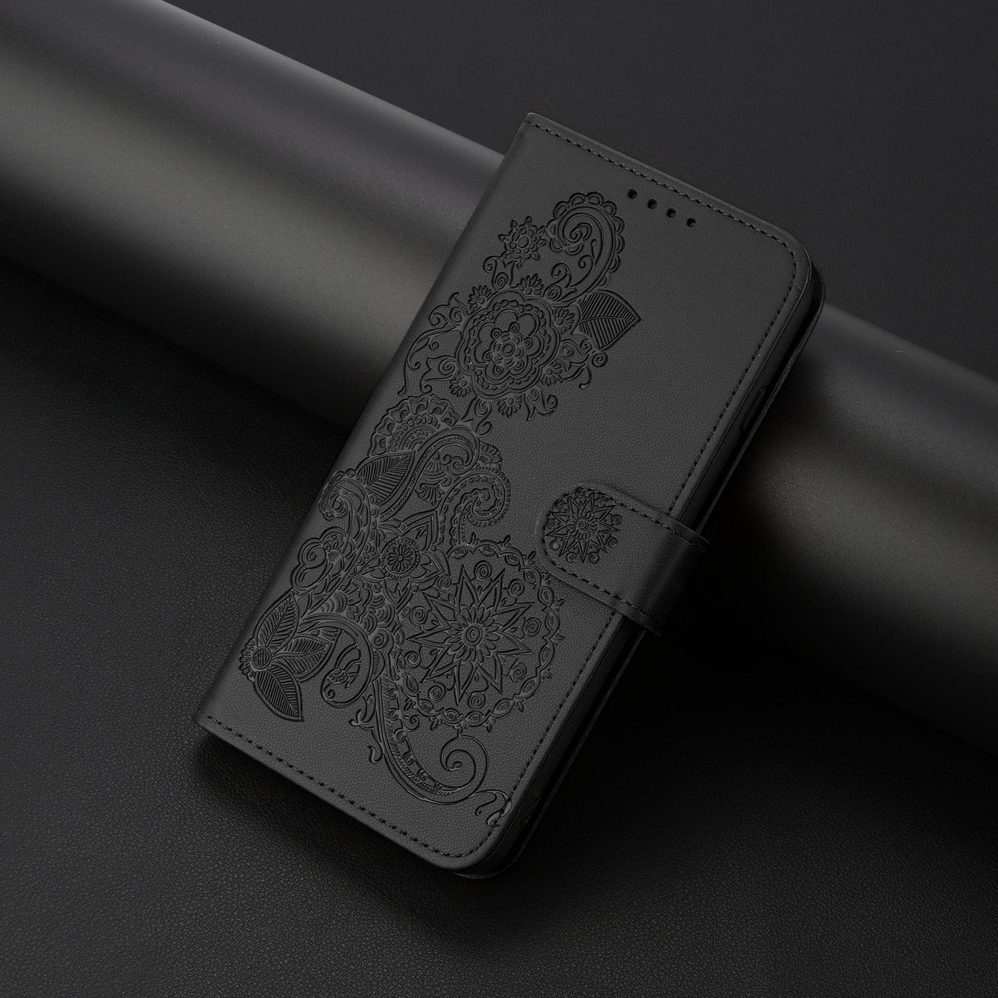 For iPhone 16e Datura Flower Embossed Flip Leather Phone Case(Black)