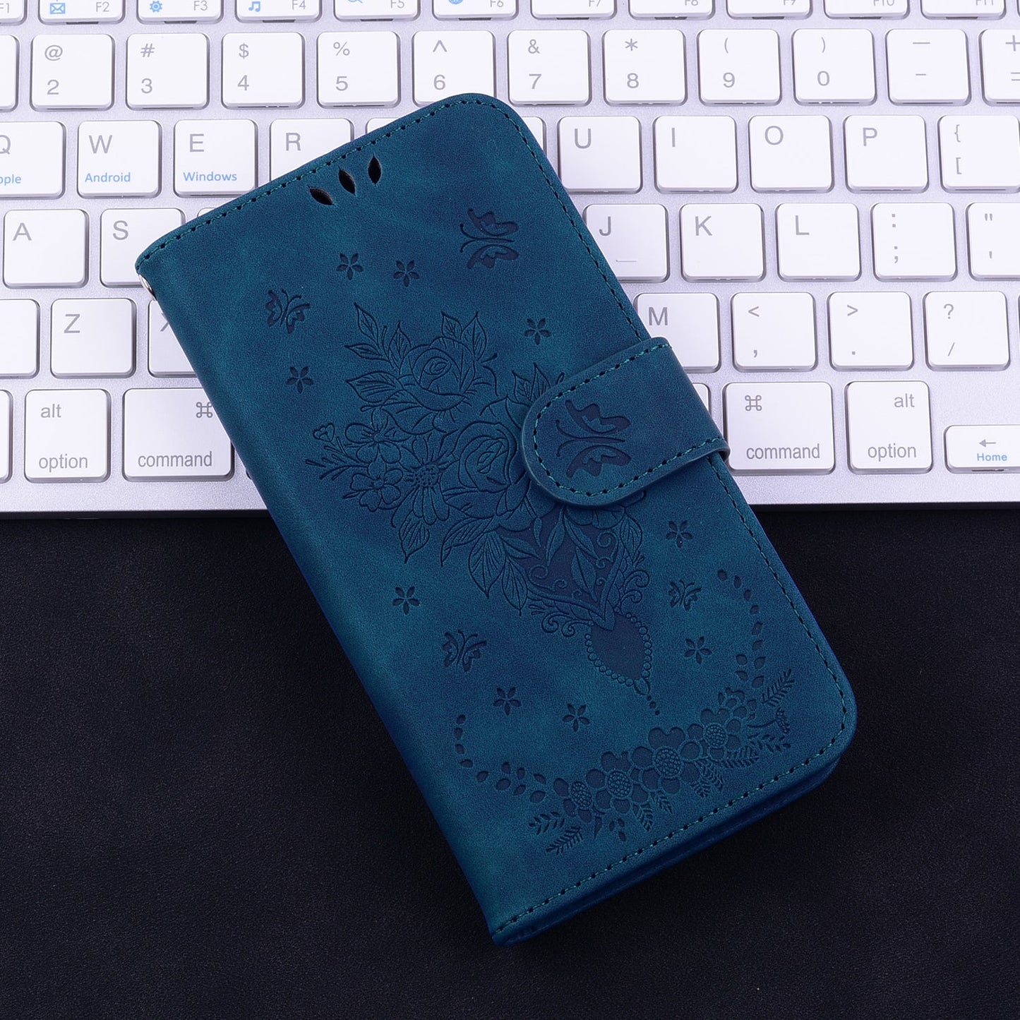 For iPhone 16e Butterfly Rose Embossed Leather Phone Case(Blue)