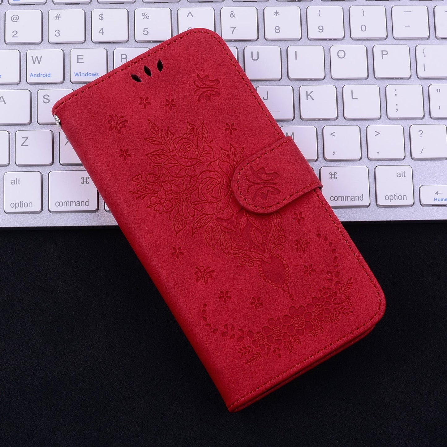 For iPhone 16e Butterfly Rose Embossed Leather Phone Case(Red)