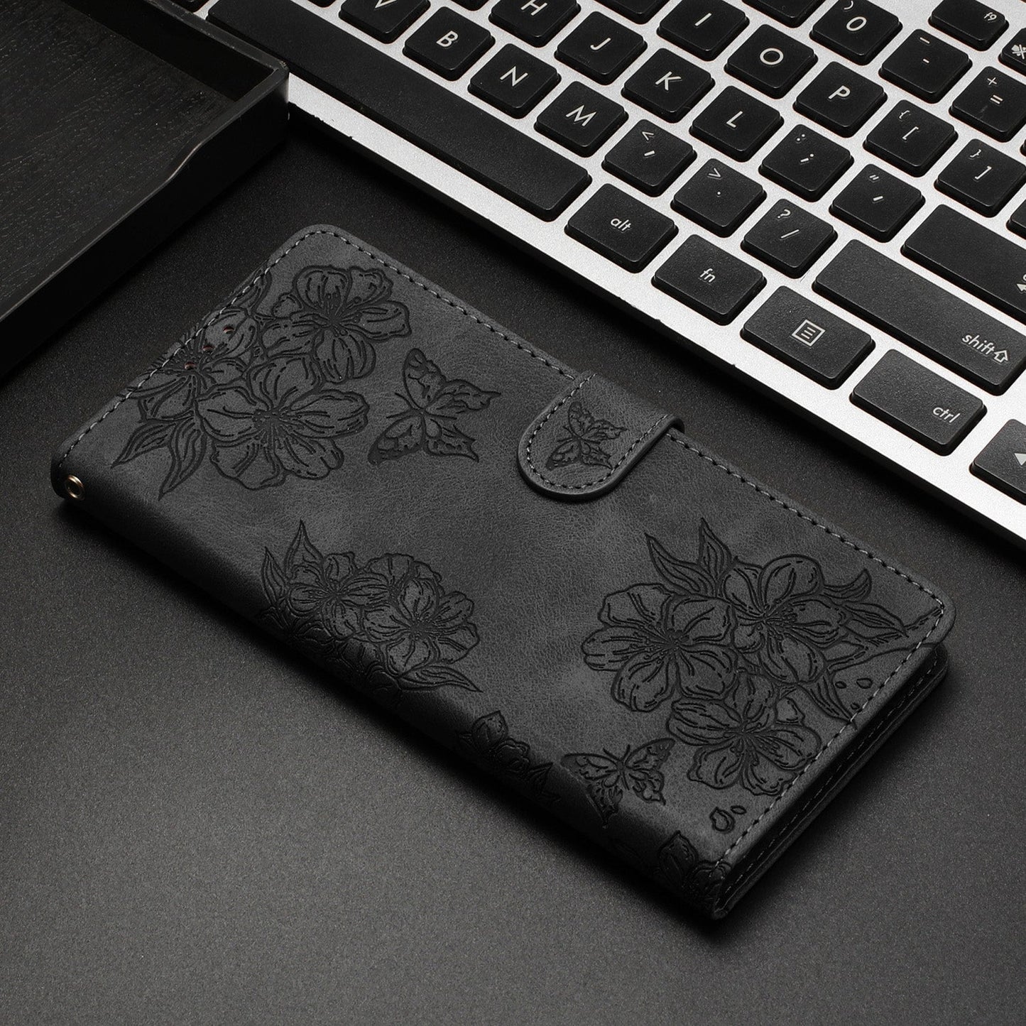 For Redmi 14C 4G Cherry Blossom Butterfly Skin Feel Embossed PU Phone Case(Black)