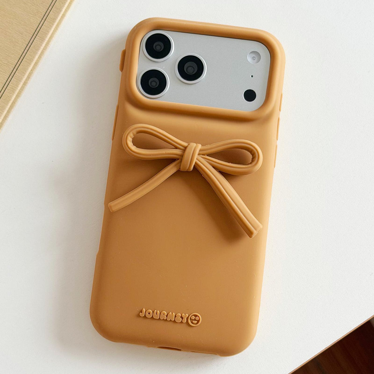 Compatible with iPhone 18 Pro Max & 17 Pro Max Bow TPU Dual-Layer PC Bulge Phone Case - Brown