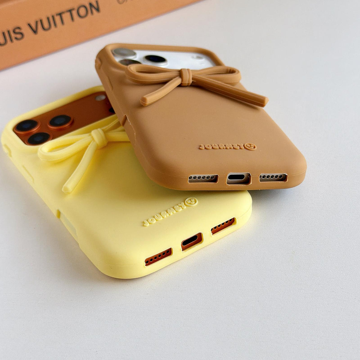 Compatible with iPhone 18 Pro Max & 17 Pro Max Bow TPU Dual-Layer PC Bulge Phone Case - Brown