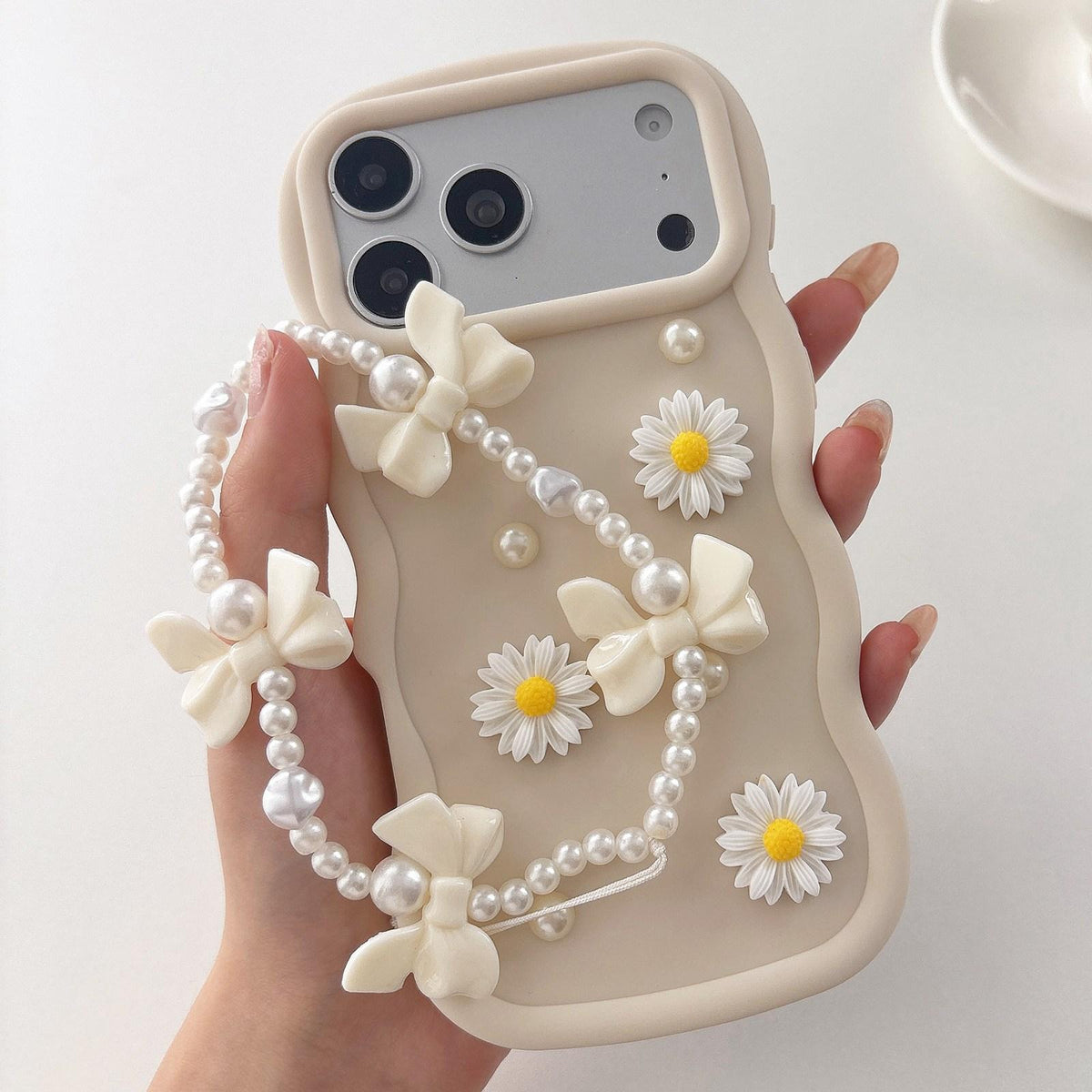 Compatible with iPhone 18 Pro Max Macaron Color Little Daisy and Pearl Phone Case with Bracelet Chain - White