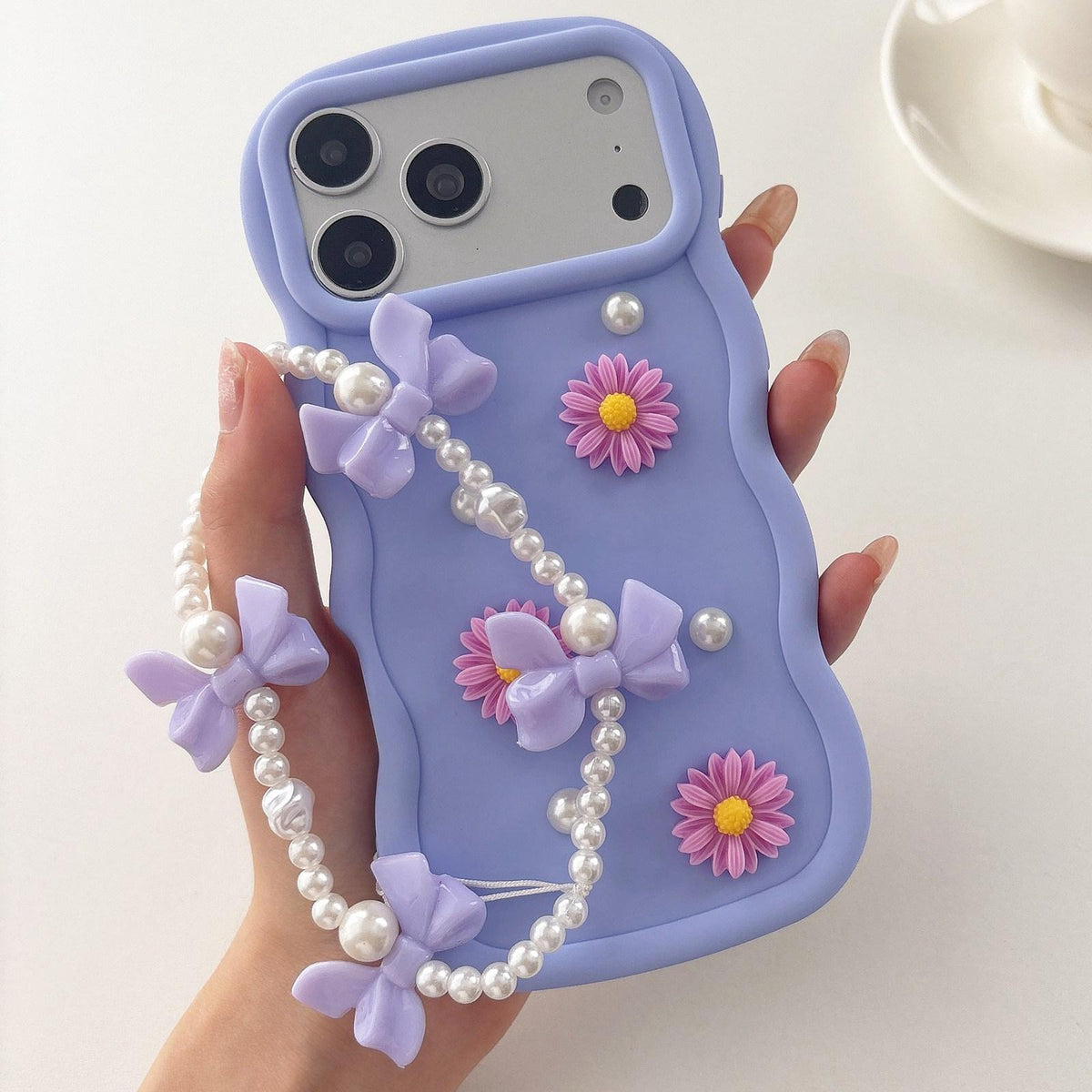 Compatible with iPhone 18 Pro Macaron Color Little Daisy and Pearl Phone Case with Bracelet Chain - Purple