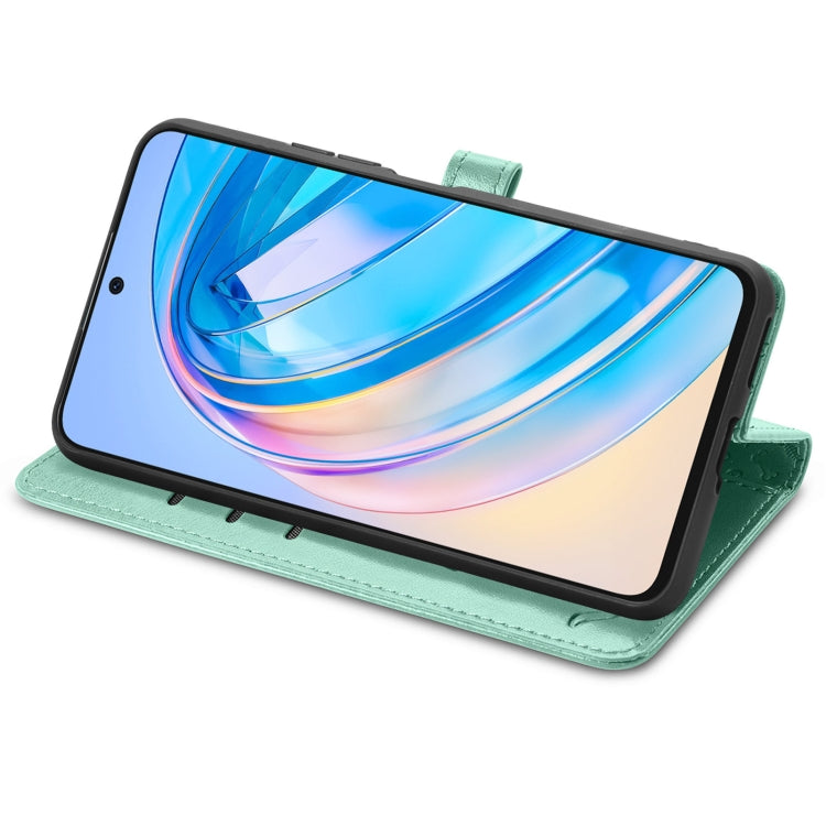 For Honor X6A Cat and Dog Embossed Leather Phone Case(Green)